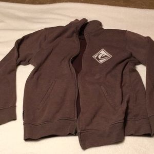 Brown zip up sweatshirt.